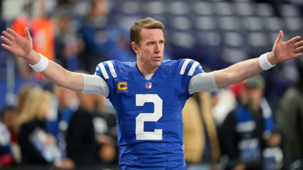Former Colts quarterback Matt Ryan warms up before a game.